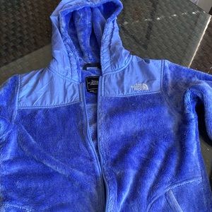 The North Face fuzzy zip up jacket with packets and hood.